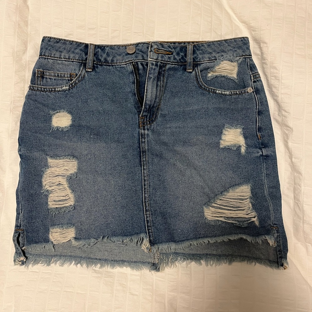 Distressed denim skirt